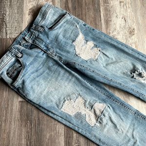Men’s jeans with rips and tears
